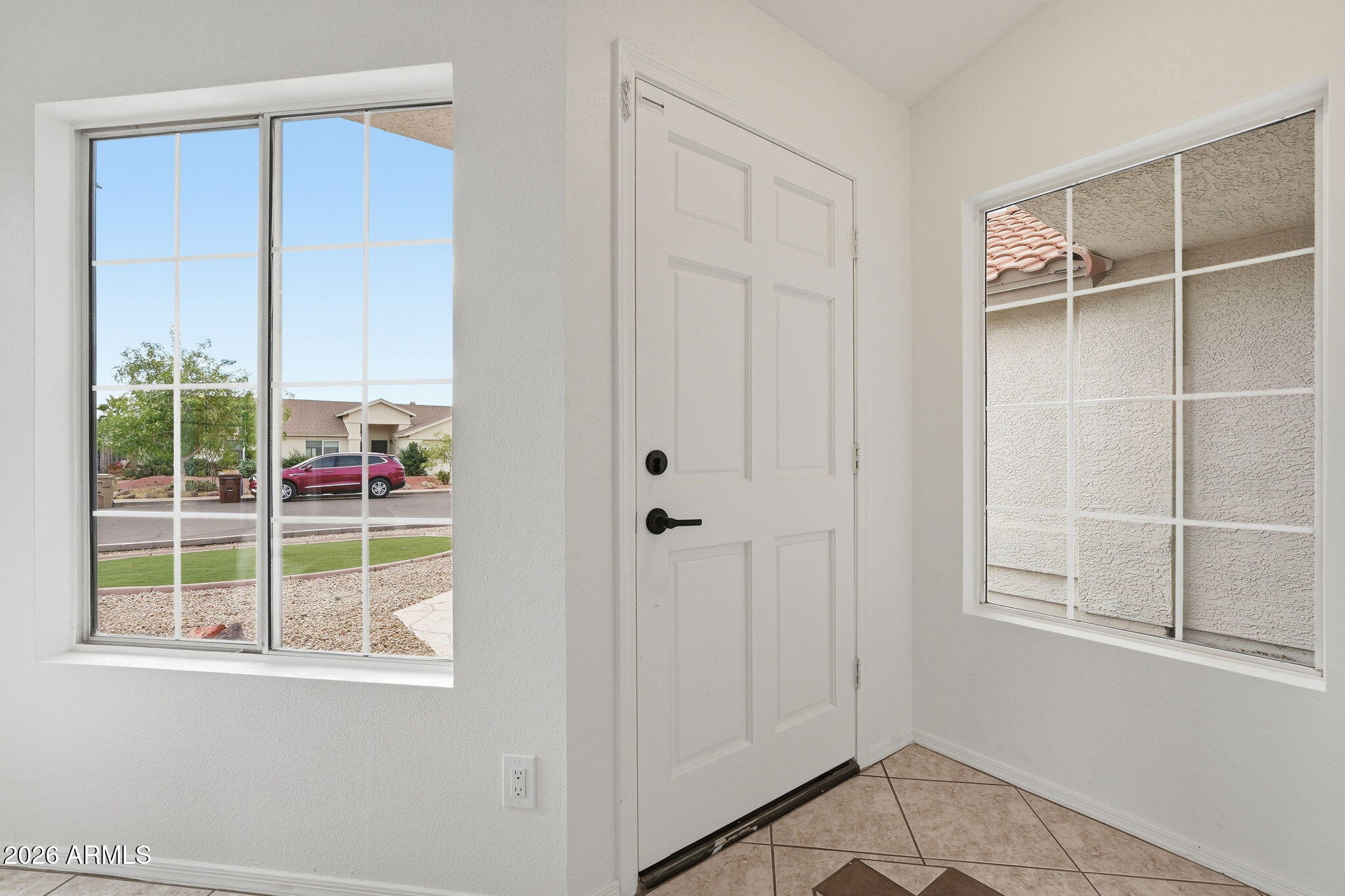 7756 West Hearn Road Peoria, AZ 85381 - Photo 6 of 41 a view of a closet area with an empty room