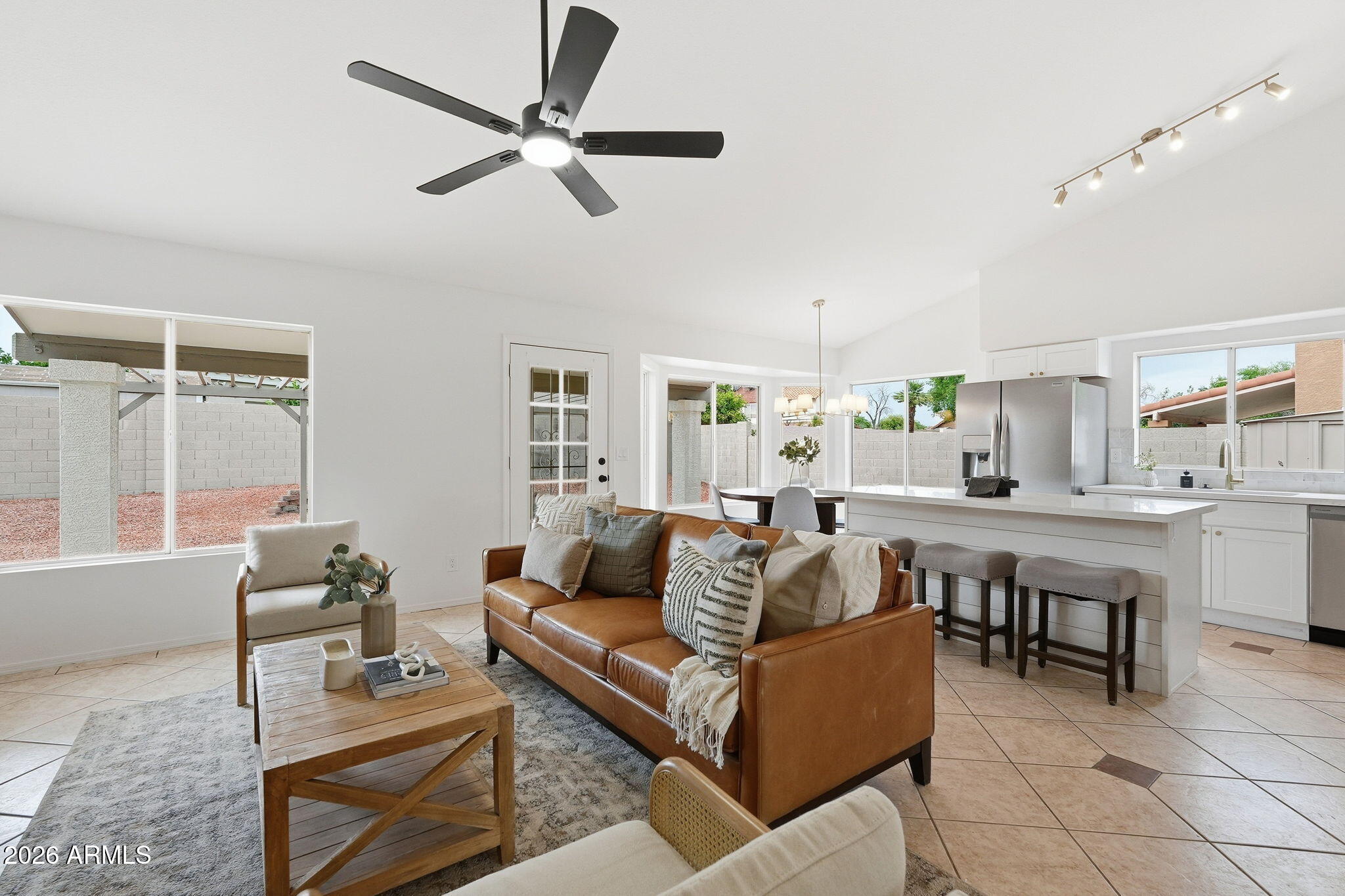 7756 West Hearn Road Peoria, AZ 85381 - Photo 10 of 41 a living room with furniture and a window