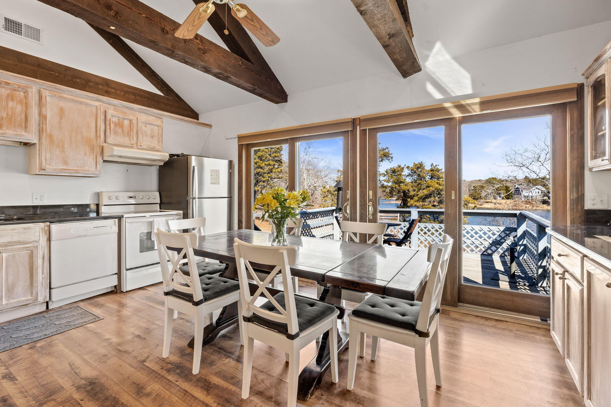 552 Orleans Road North Chatham, MA 02650 - Photo 12 of 31 a view of a dining room with furniture window and outside view