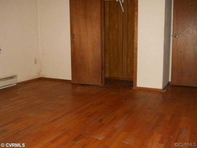 17093 Annfield Road Beaverdam, VA 23015 - Photo 3 of 6 a view of an empty room with wooden floor