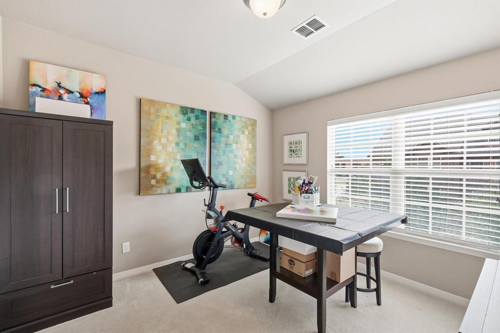 3941 Asbury Lane Addison, TX 75001 - Photo 24 of 30 a view of a workspace with furniture and a window