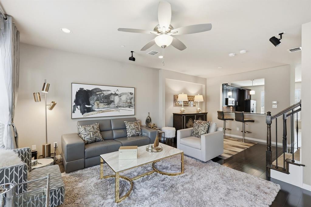 3941 Asbury Lane Addison, TX 75001 - Photo 7 of 30 a living room with furniture a rug and white walls