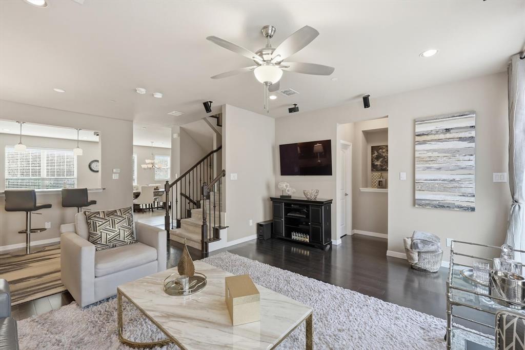 3941 Asbury Lane Addison, TX 75001 - Photo 9 of 30 a living room with furniture and a fireplace