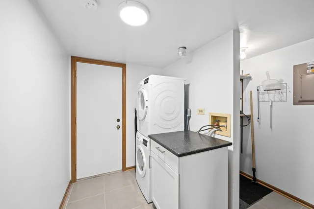 a view of a house with a snow in the yard