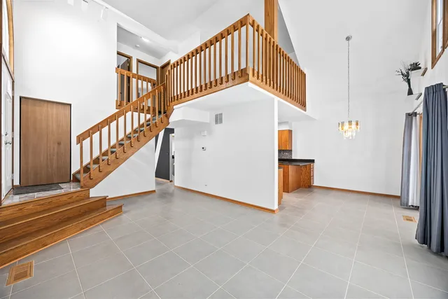 a view of a hallway with staircase