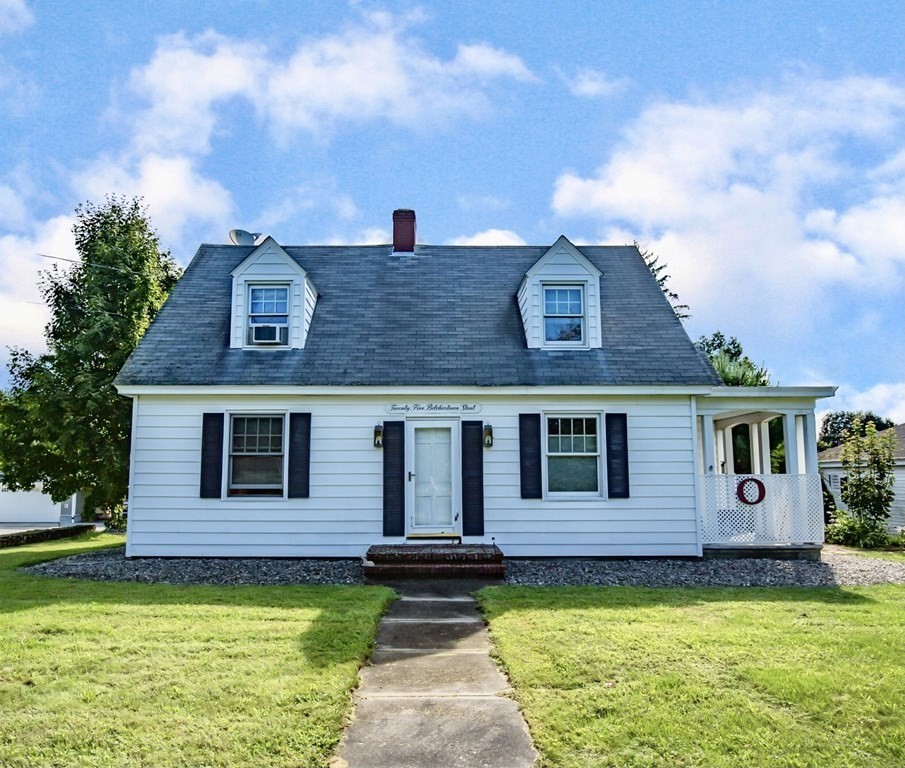 25 Belchertown Street Three Rivers, MA 01080 - Photo 1 of 32 a front view of a house with a garden