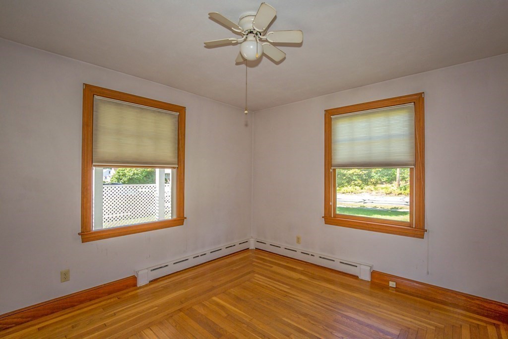 25 Belchertown Street Three Rivers, MA 01080 - Photo 17 of 32 a view of an empty room with a window and wooden floor