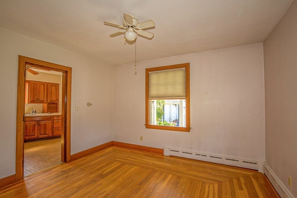 25 Belchertown Street Three Rivers, MA 01080 - Photo 18 of 32 a view of an empty room with wooden floor and a window