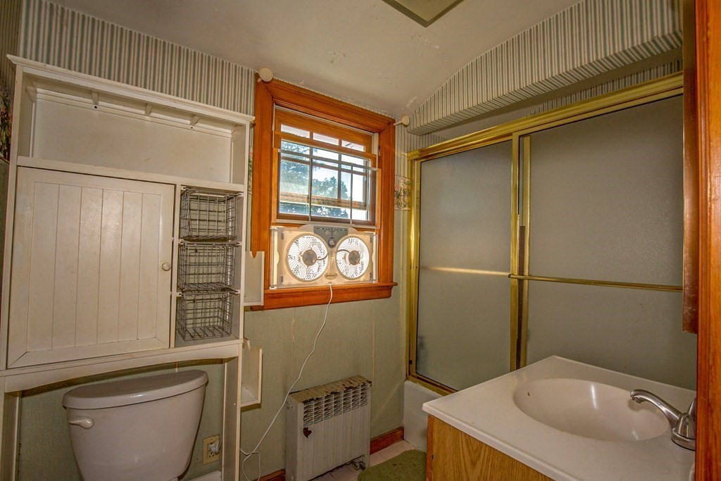 25 Belchertown Street Three Rivers, MA 01080 - Photo 23 of 32 a bathroom with a sink a toilet and shower