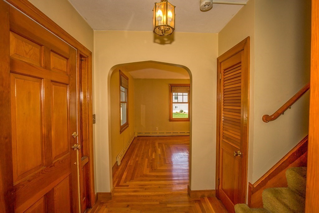 25 Belchertown Street Three Rivers, MA 01080 - Photo 5 of 32 a view of front door with wooden floor