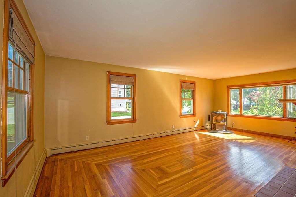 25 Belchertown Street Three Rivers, MA 01080 - Photo 7 of 32 a view of an empty room with wooden floor and a window