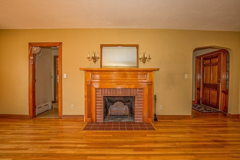 25 Belchertown Street Three Rivers, MA 01080 - Photo 10 of 32 a living room with a fireplace