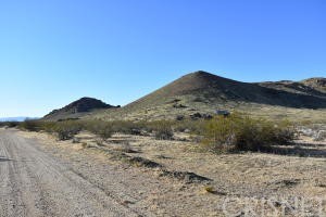a view of mountain and a mountain