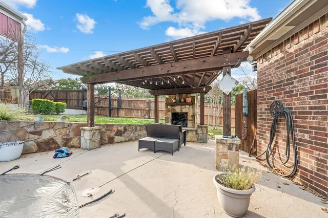a patio with patio a couch and chairs