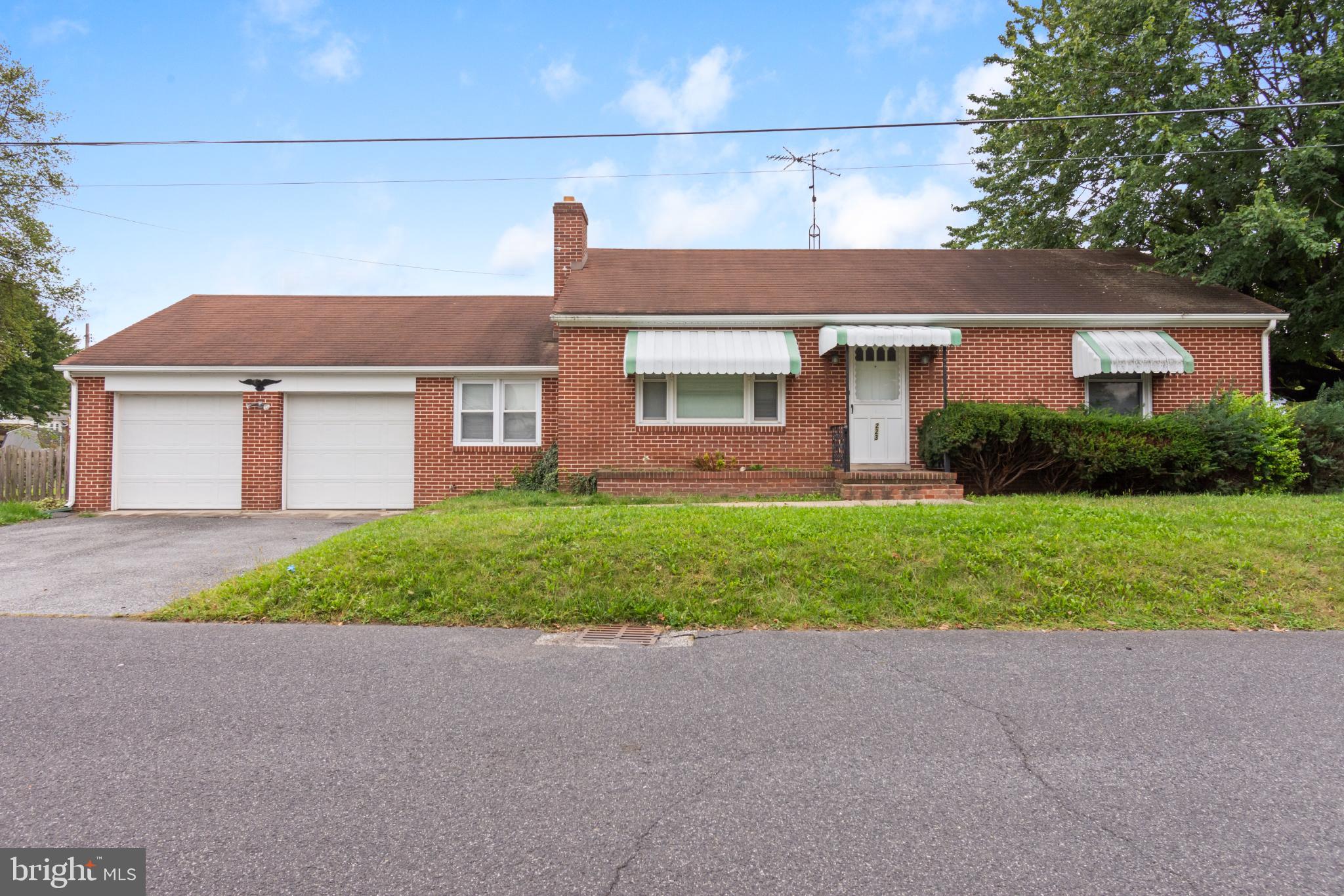 223 Carroll Heights Road Taneytown, MD 21787 - Photo 1 of 32 Charming brick home with inviting curb appeal.