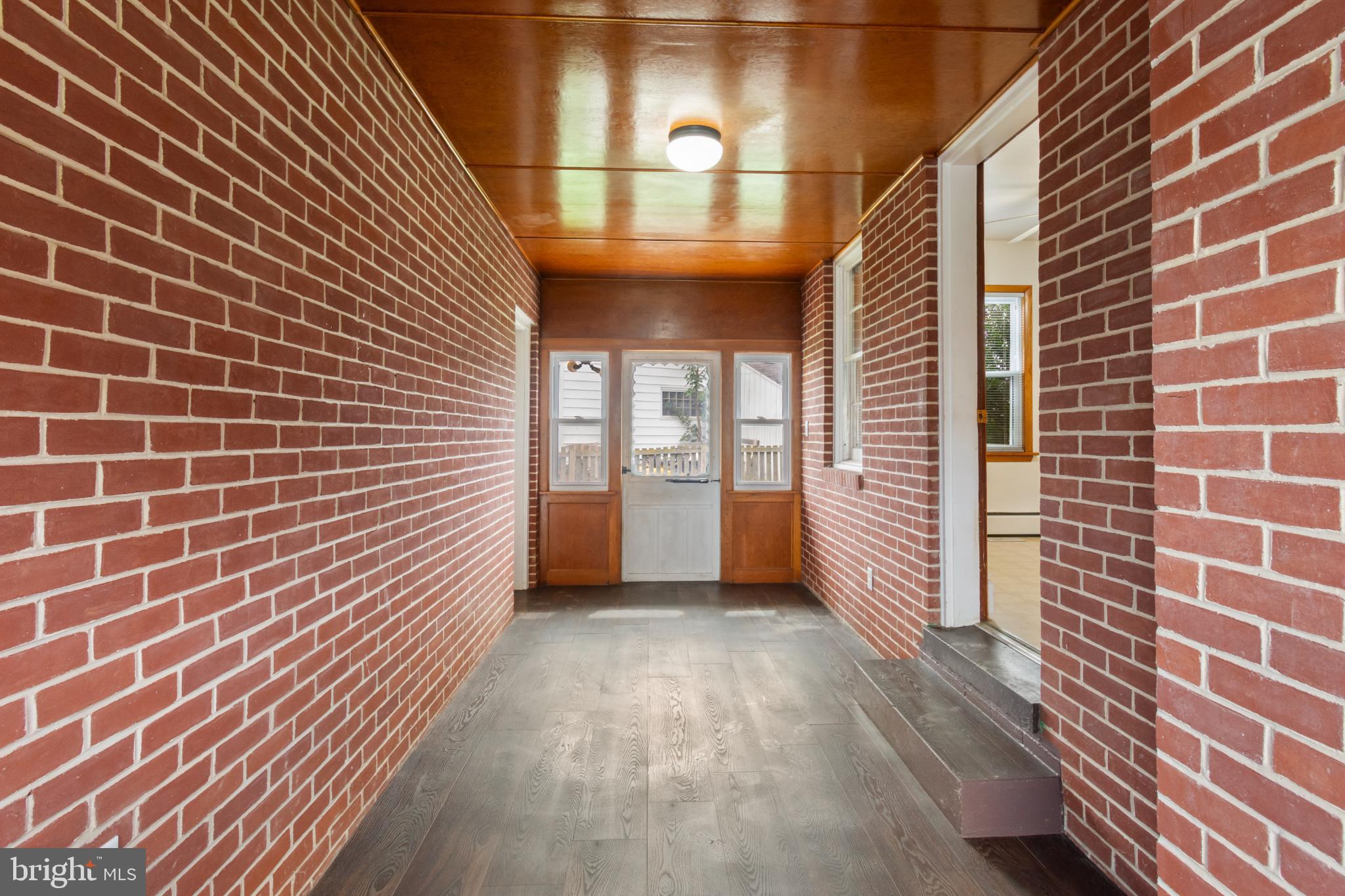 223 Carroll Heights Road Taneytown, MD 21787 - Photo 11 of 32 Inviting entryway with rich brick accents.