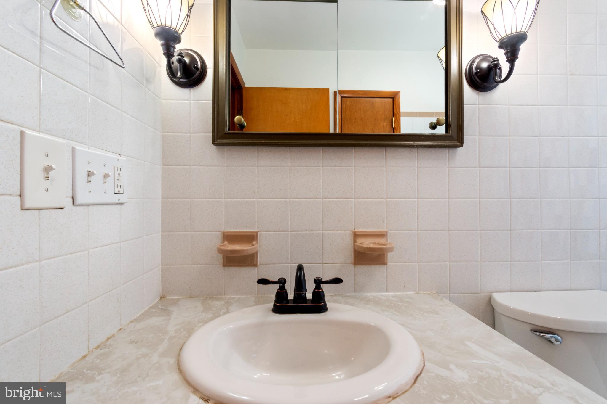 223 Carroll Heights Road Taneytown, MD 21787 - Photo 15 of 32 Classic elegance in a timeless bathroom.