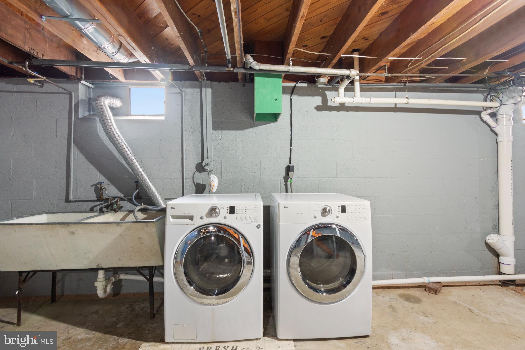 223 Carroll Heights Road Taneytown, MD 21787 - Photo 24 of 32 Functional laundry space with modern appliances.