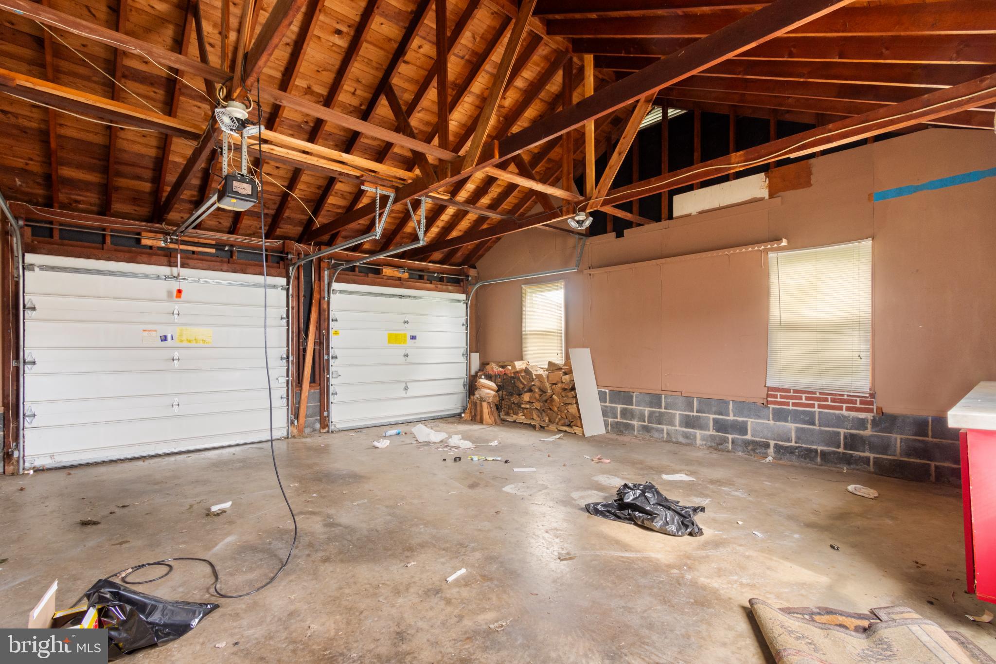 223 Carroll Heights Road Taneytown, MD 21787 - Photo 25 of 32 Spacious garage with rustic charm.