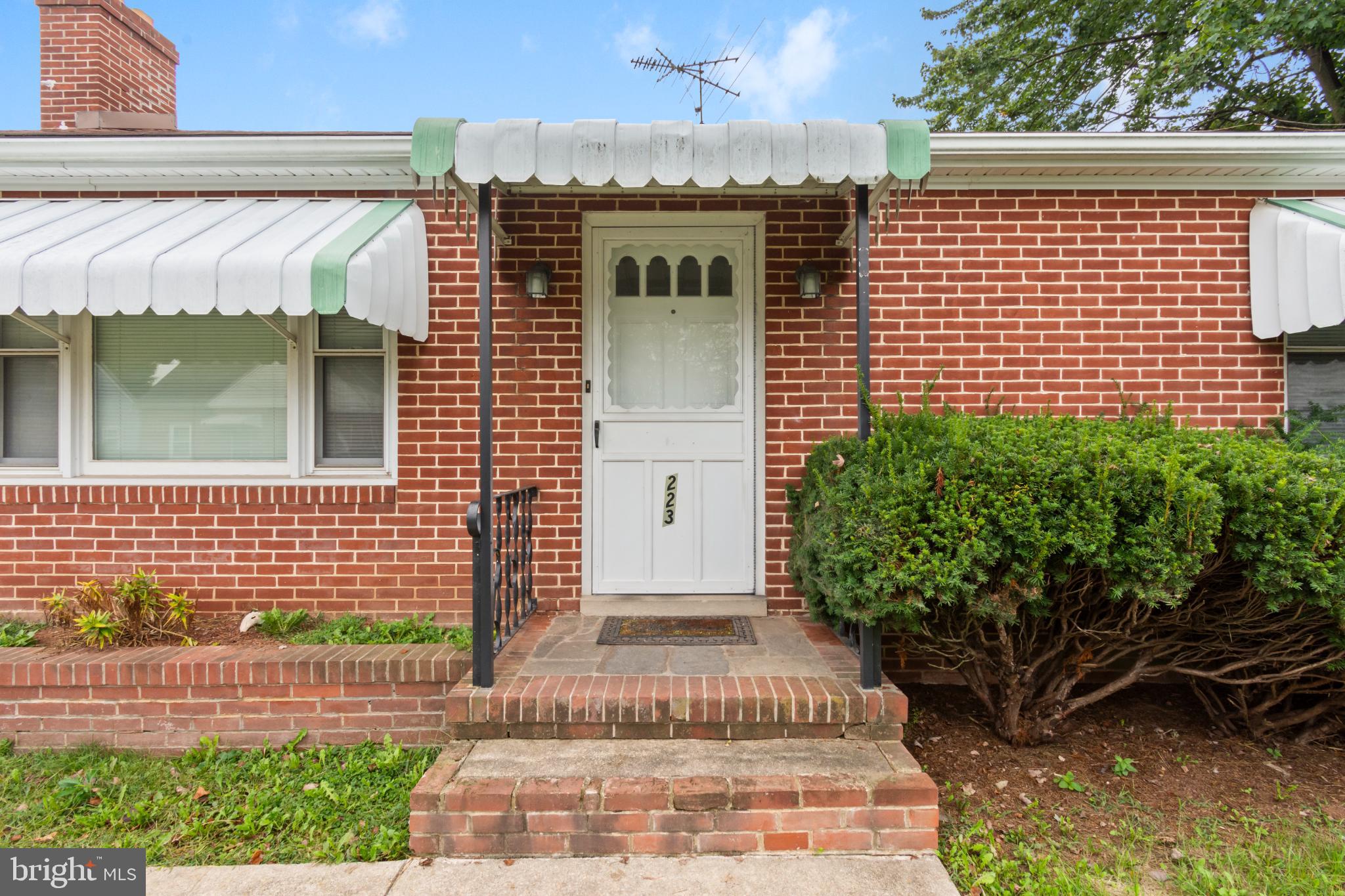 223 Carroll Heights Road Taneytown, MD 21787 - Photo 3 of 32 Charming brick facade with welcoming entryway.