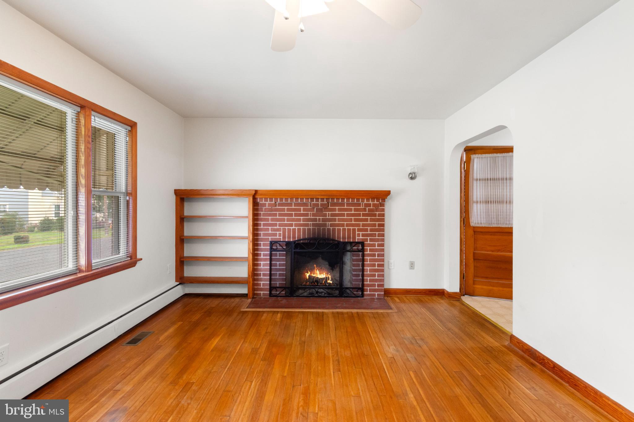 223 Carroll Heights Road Taneytown, MD 21787 - Photo 5 of 32 Cozy living space with charming fireplace.