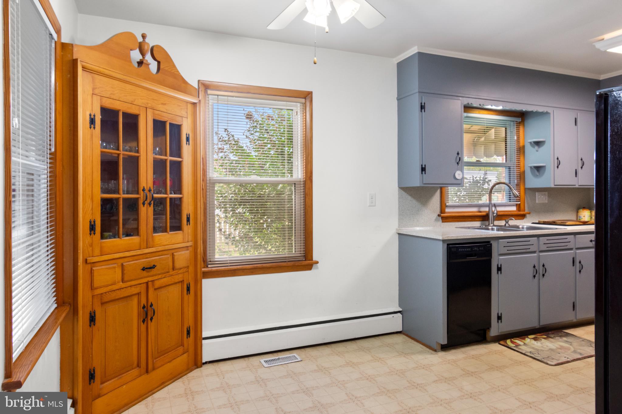 223 Carroll Heights Road Taneytown, MD 21787 - Photo 6 of 32 Charming kitchen with classic wood accents.