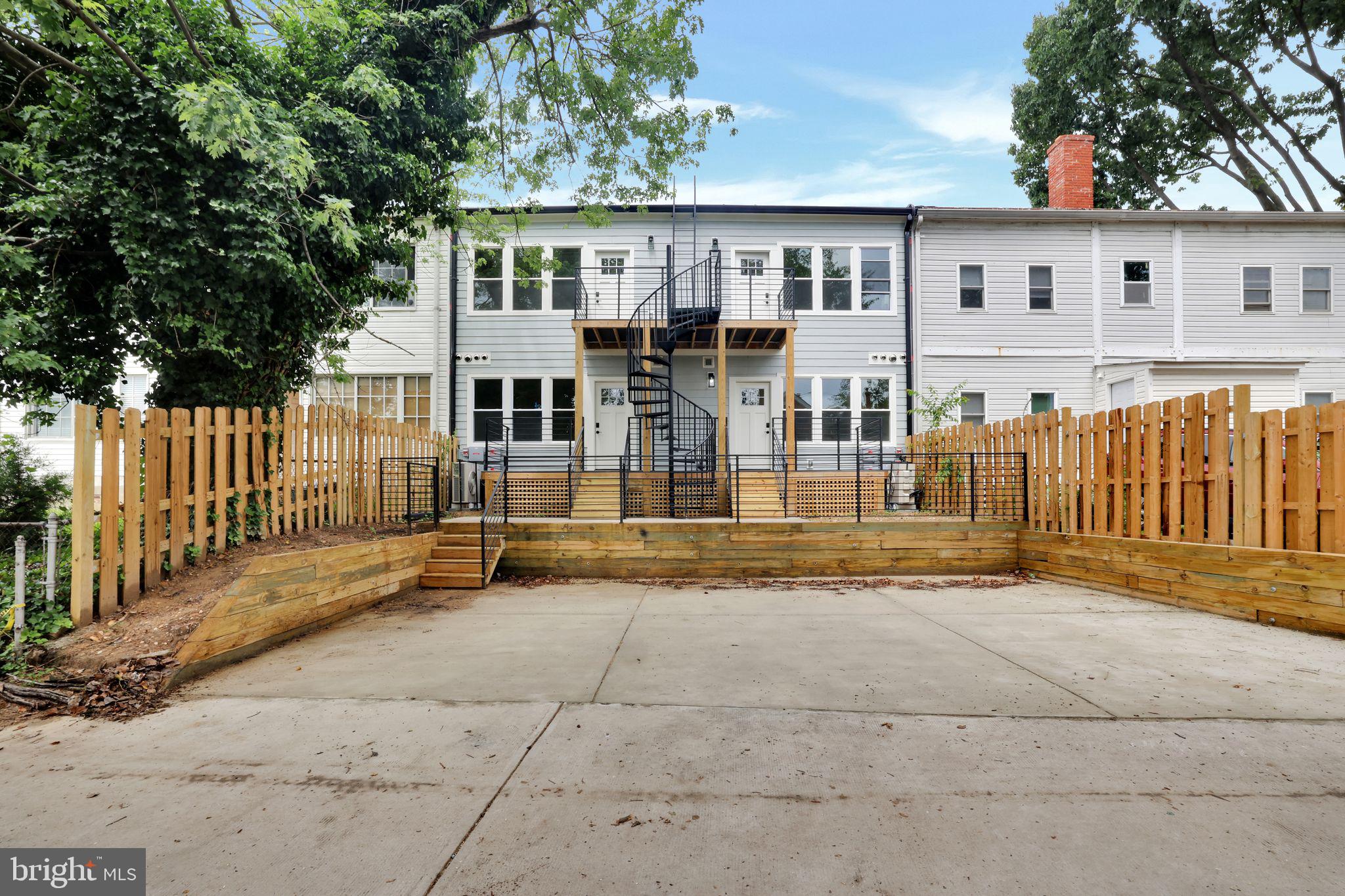 4019 9th Street Northeast, Unit 1 Washington, DC 20017 - Photo 25 of 27 front view of house with a yard