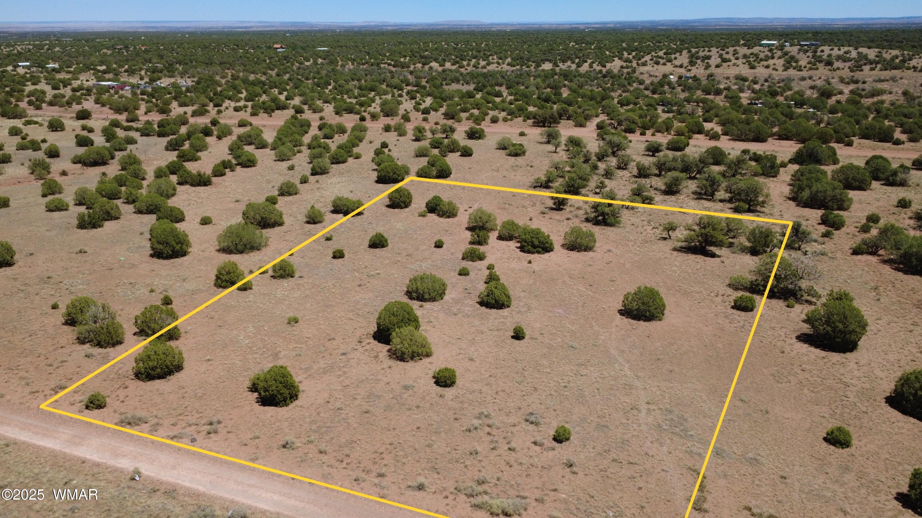4247 East Pinto Road Snowflake, AZ 85937 - Photo 2 of 16 an aerial view of residential houses with outdoor space
