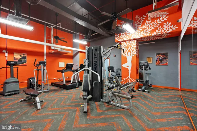 a view of room with furniture and book shelf