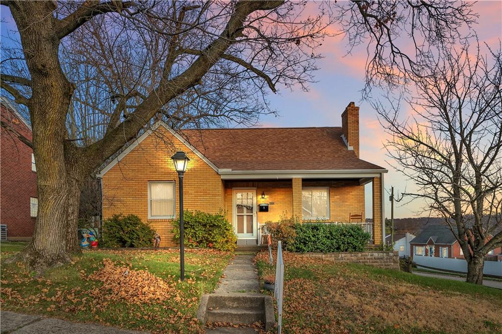 600 Colfax Street Springdale, PA 15144 - Photo 1 of 18 a front view of a house with a yard