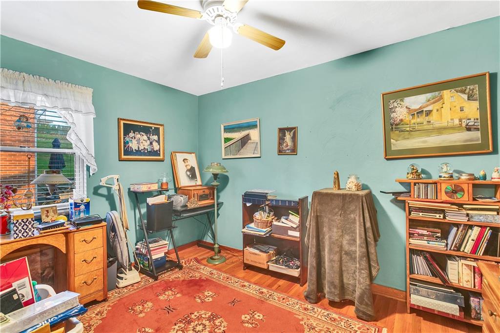 600 Colfax Street Springdale, PA 15144 - Photo 12 of 18 a room with furniture and a window