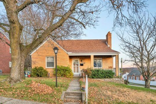 600 Colfax Street Springdale, PA 15144 - Photo 2 of 18 a front view of a house with a yard