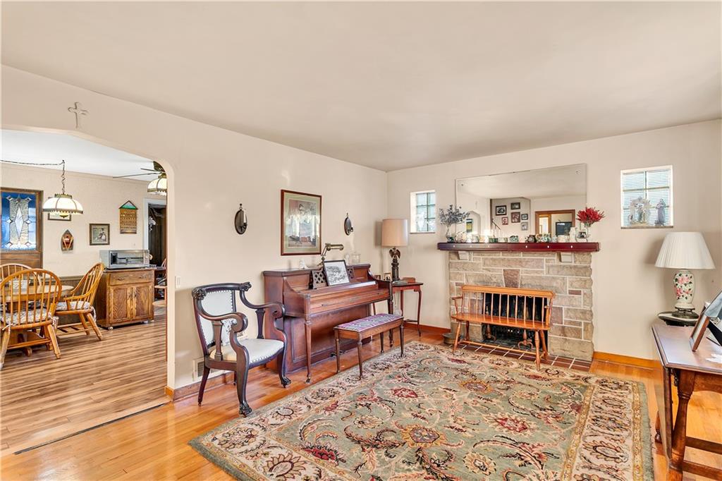 600 Colfax Street Springdale, PA 15144 - Photo 6 of 18 a living room with furniture and a wooden floor