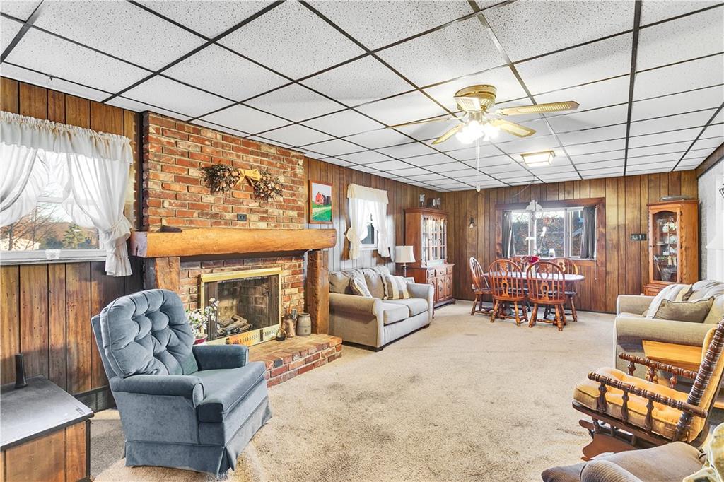 600 Colfax Street Springdale, PA 15144 - Photo 9 of 18 a living room with furniture a fireplace and walls