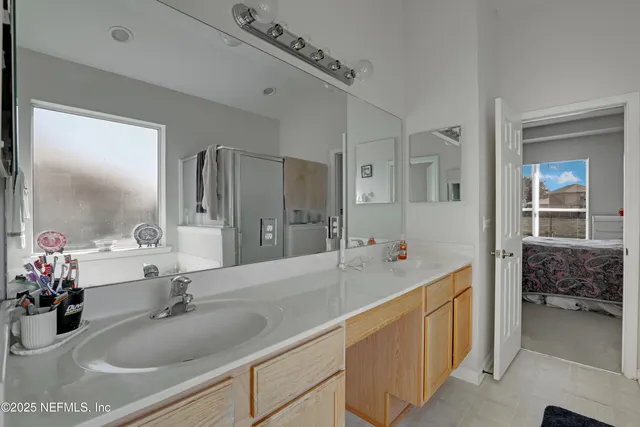 a bathroom with a sink double vanity