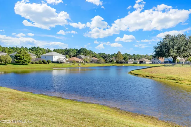 a view of a swimming pool and an outdoor space