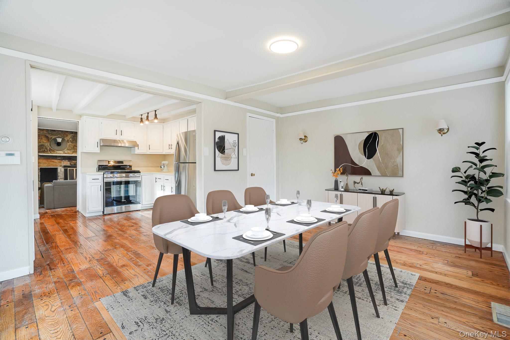 14 Old Rte 55 Pawling, NY 12564 - Photo 12 of 27 Dining space with light wood-style flooring and beamed ceiling