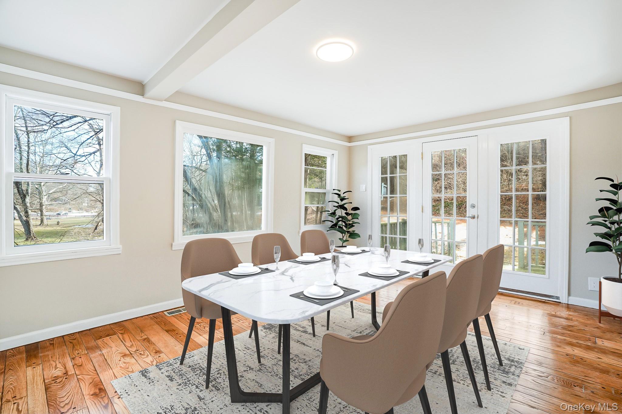 14 Old Rte 55 Pawling, NY 12564 - Photo 14 of 27 Dining room with healthy amount of natural light, light wood finished floors, beamed ceiling, and french doors