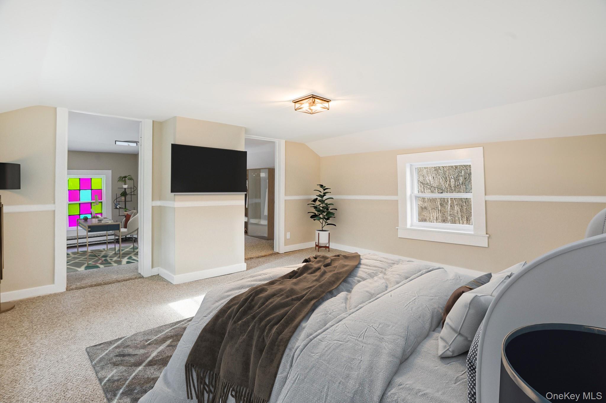 14 Old Rte 55 Pawling, NY 12564 - Photo 21 of 27 Carpeted bedroom with lofted ceiling, multiple windows, and a baseboard heating unit