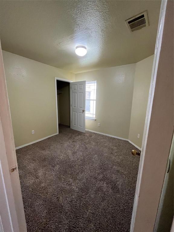 3001 Caleb Drive Austin, TX 78725 - Photo 11 of 16 en empty room with windows