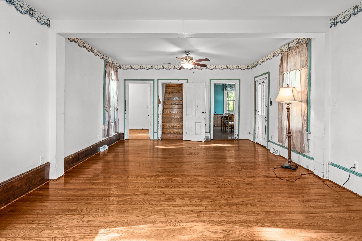 200 West Locust Street Cambridge, IL 61238 - Photo 20 of 32 a view of an empty room with window and wooden floor
