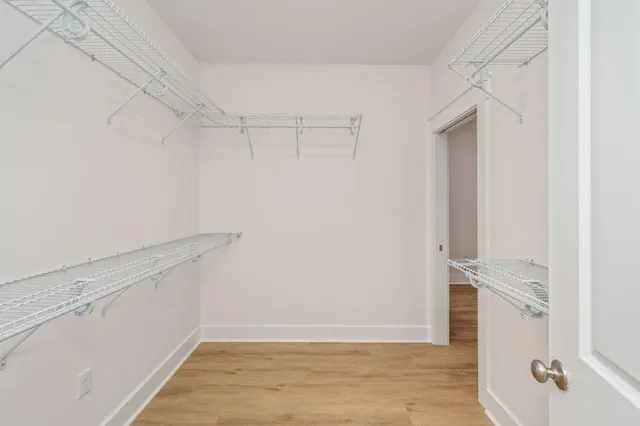 a view of an empty walk in closet