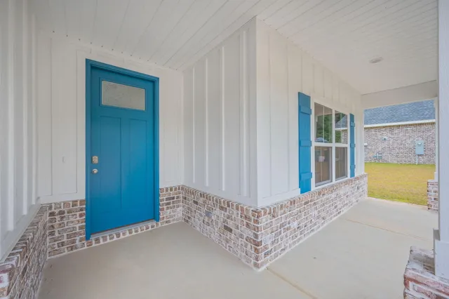 a bed room with a bed and a window