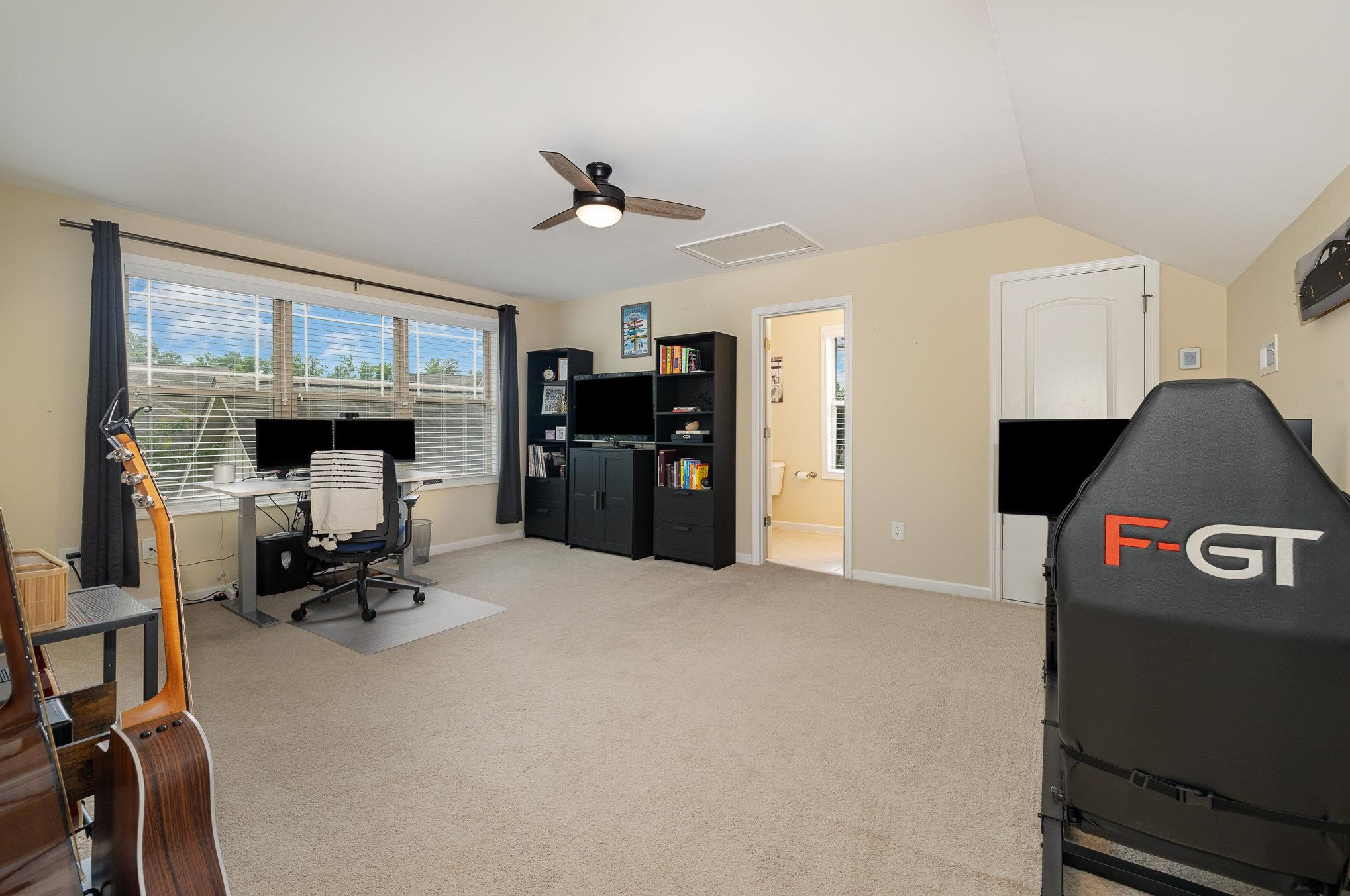 5522 Wade Park Boulevard Raleigh, NC 27607 - Photo 11 of 17 Generous Finished Room Over Garage (FROG) with Full Bathroom