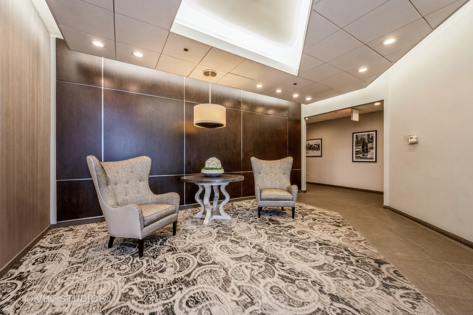720 West Randolph Street, Unit 1002 Chicago, IL 60661 - Photo 10 of 10 a living room with a rug