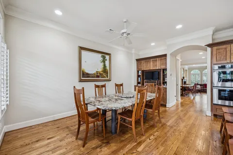 a view of a livingroom with furniture hardwood floor and a rug
