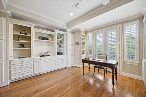 a bathroom with a tub and a shower