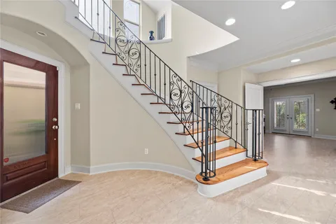a view of entryway with wooden floor