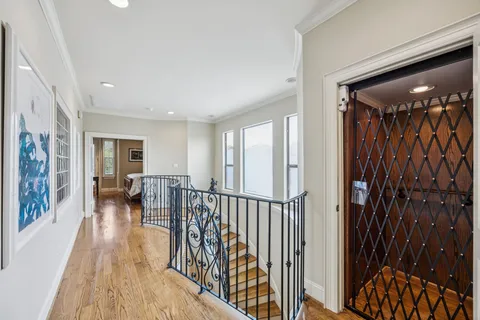 a bedroom with a large bed and a tv