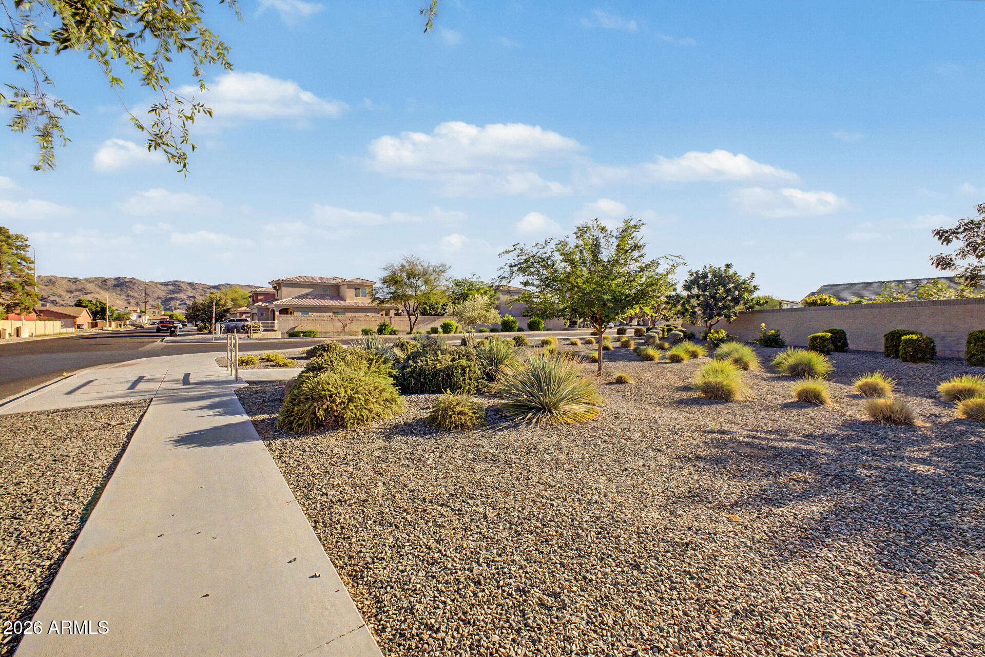 7206 South 12th Way Phoenix, AZ 85042 - Photo 33 of 34 a view of a parking area